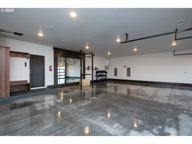 a terrace with outdoor seating and city view