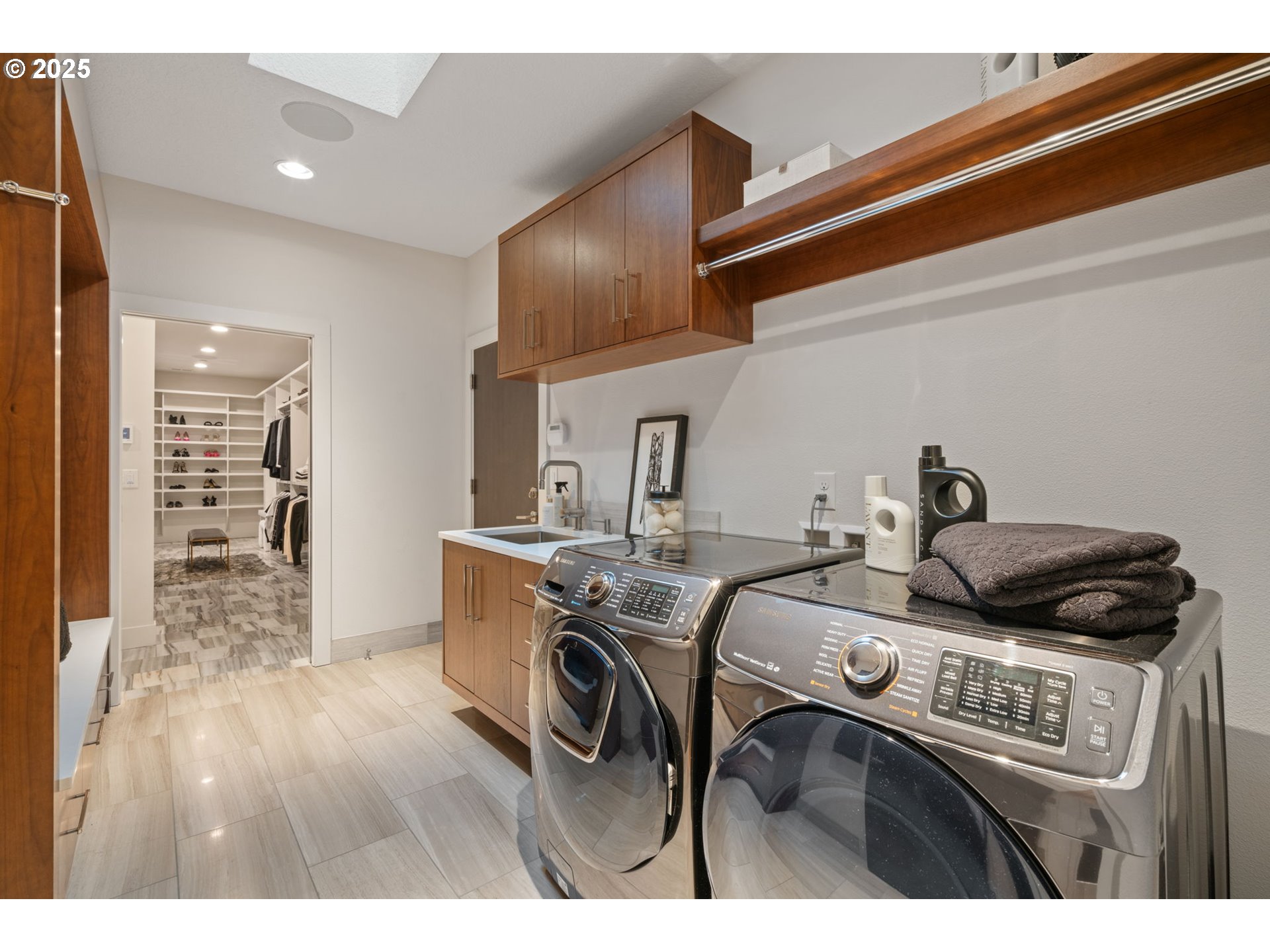 6730 Northwest Longbow Lane Camas, WA 98607 - Photo 40 of 45 a utility room with sink dryer and washer