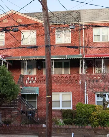 a front view of a building with retail shops