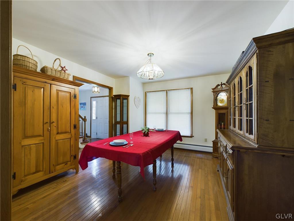 228 Barlieb Road Nazareth, PA 18064 - Photo 9 of 27 a view of a dining room with furniture window and wooden floor