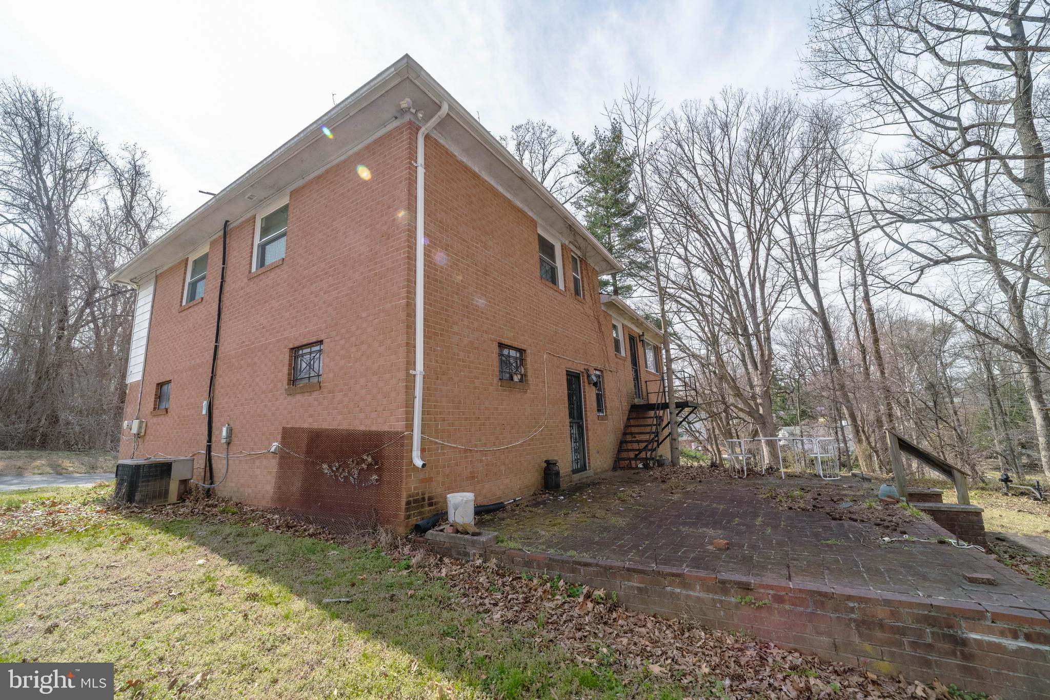 6900 Temple Hill Road Temple Hills, MD 20748 - Photo 42 of 43 a view of a house with a yard