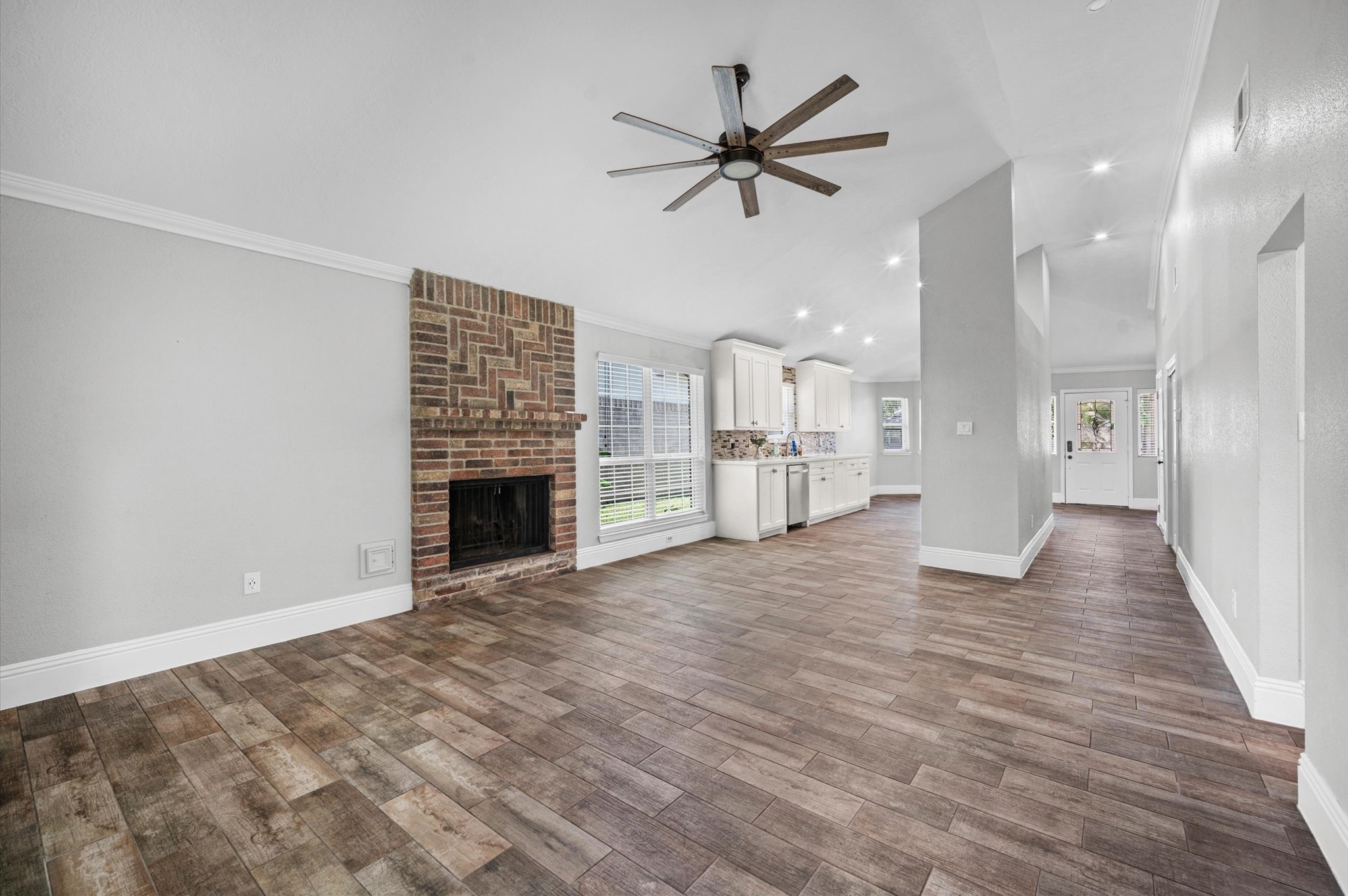 24211 Landing Way Drive Spring, TX 77373 - Photo 3 of 16 Open concept with fireplace