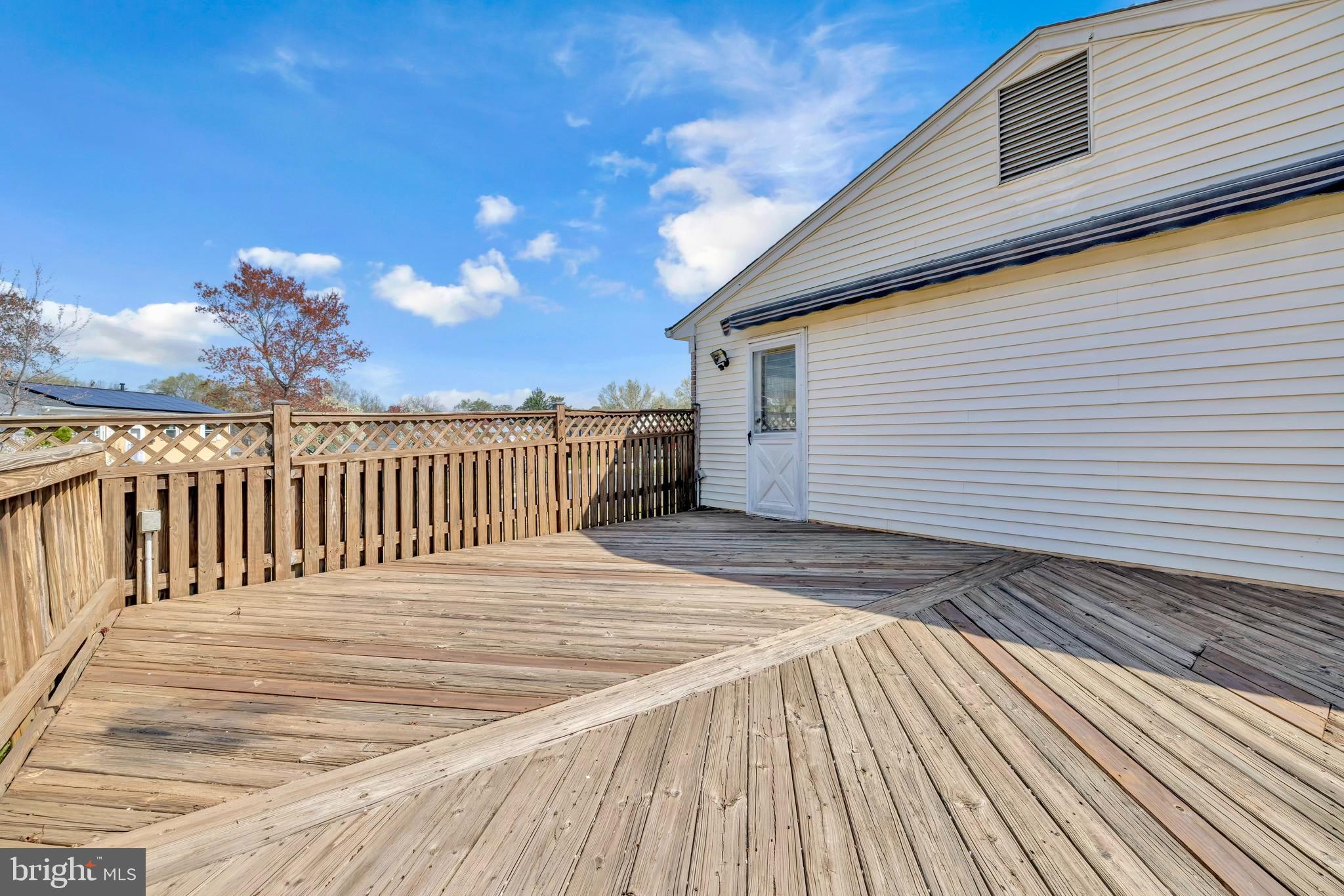 9807 Locust Avenue Lanham, MD 20706 - Photo 50 of 59 a view of a wooden deck