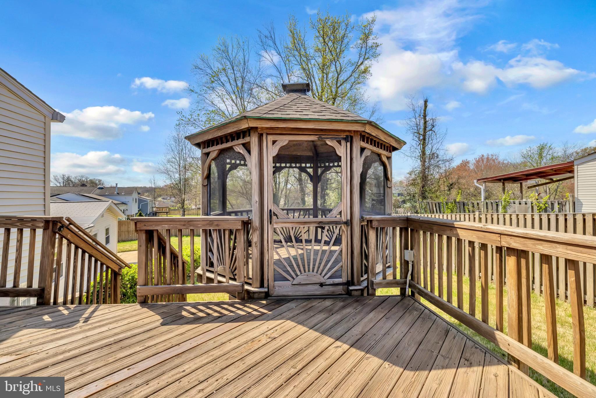9807 Locust Avenue Lanham, MD 20706 - Photo 51 of 59 a view of a wooden deck with a view of roof deck