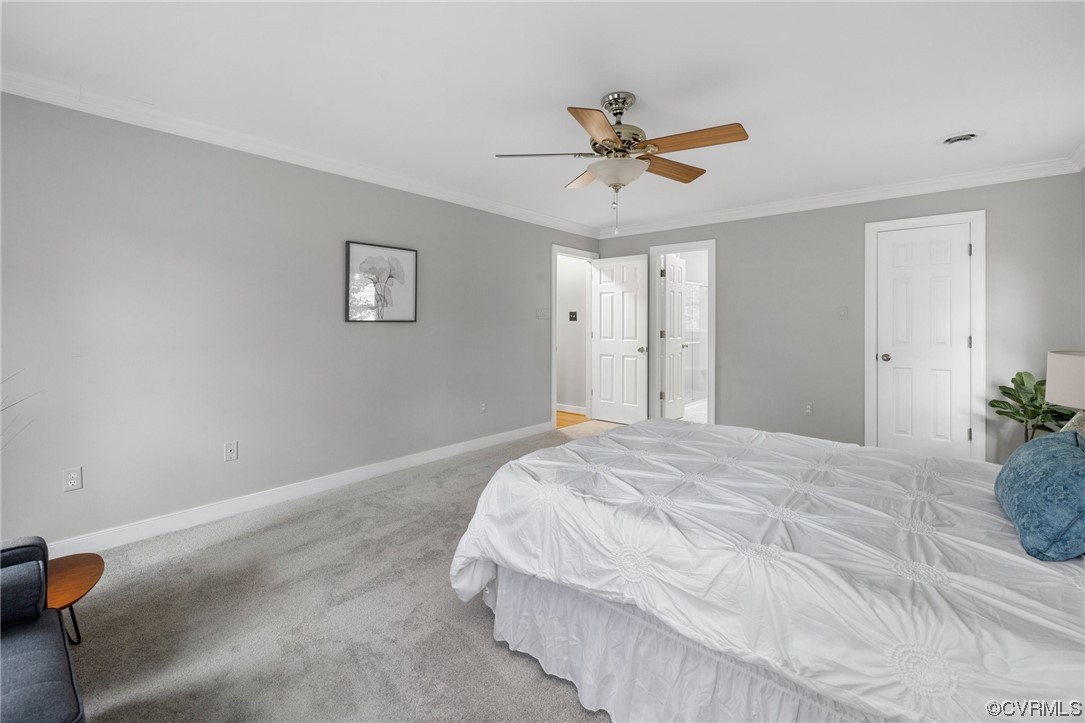 5716 Sandstone Ridge Road Midlothian, VA 23112 - Photo 22 of 36 a bedroom with a bed and window