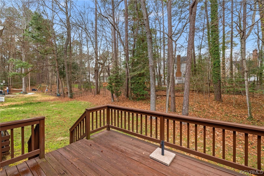 5716 Sandstone Ridge Road Midlothian, VA 23112 - Photo 33 of 36 a view of balcony with wooden floor and fence