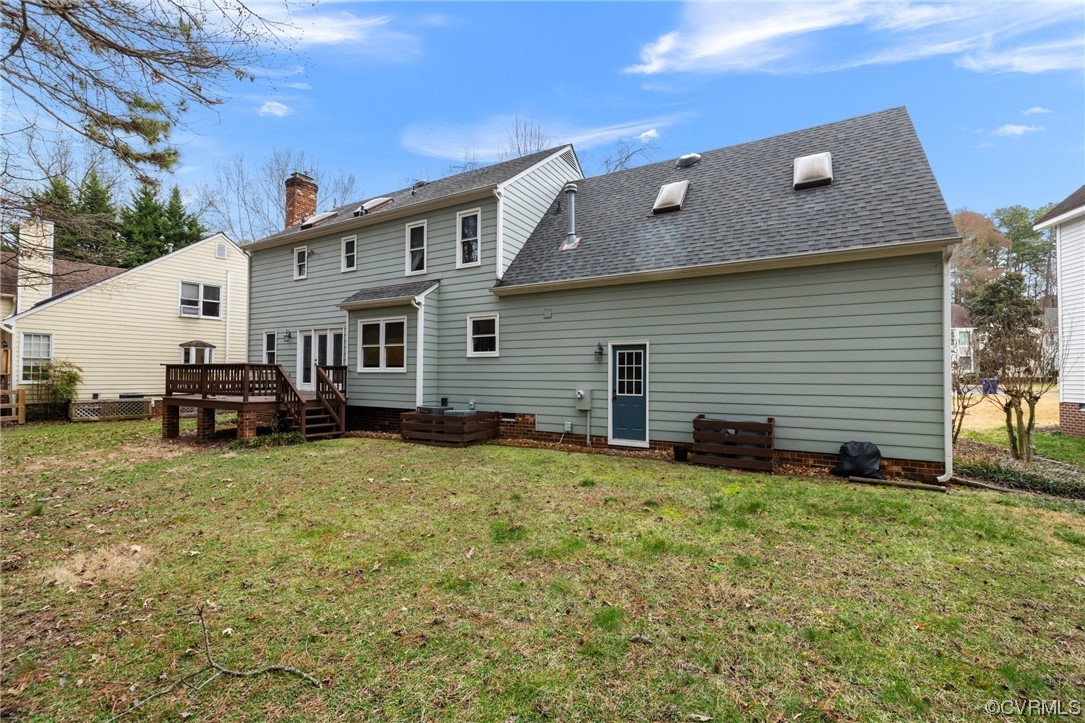 5716 Sandstone Ridge Road Midlothian, VA 23112 - Photo 36 of 36 a backyard of a house with yard and seating space