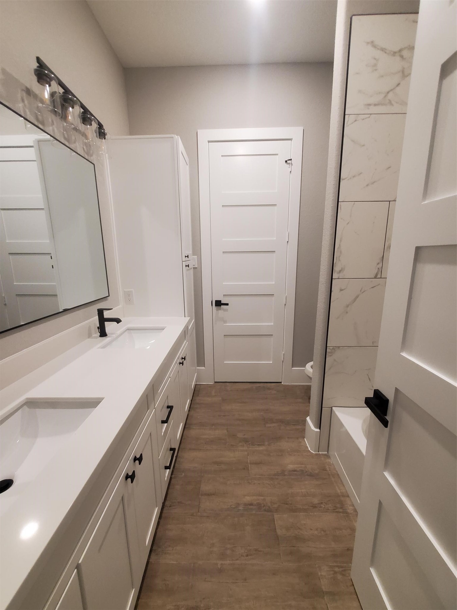 24647 Oak Creek Road Hockley, TX 77447 - Photo 15 of 47 a bathroom with a granite countertop sink a toilet and shower