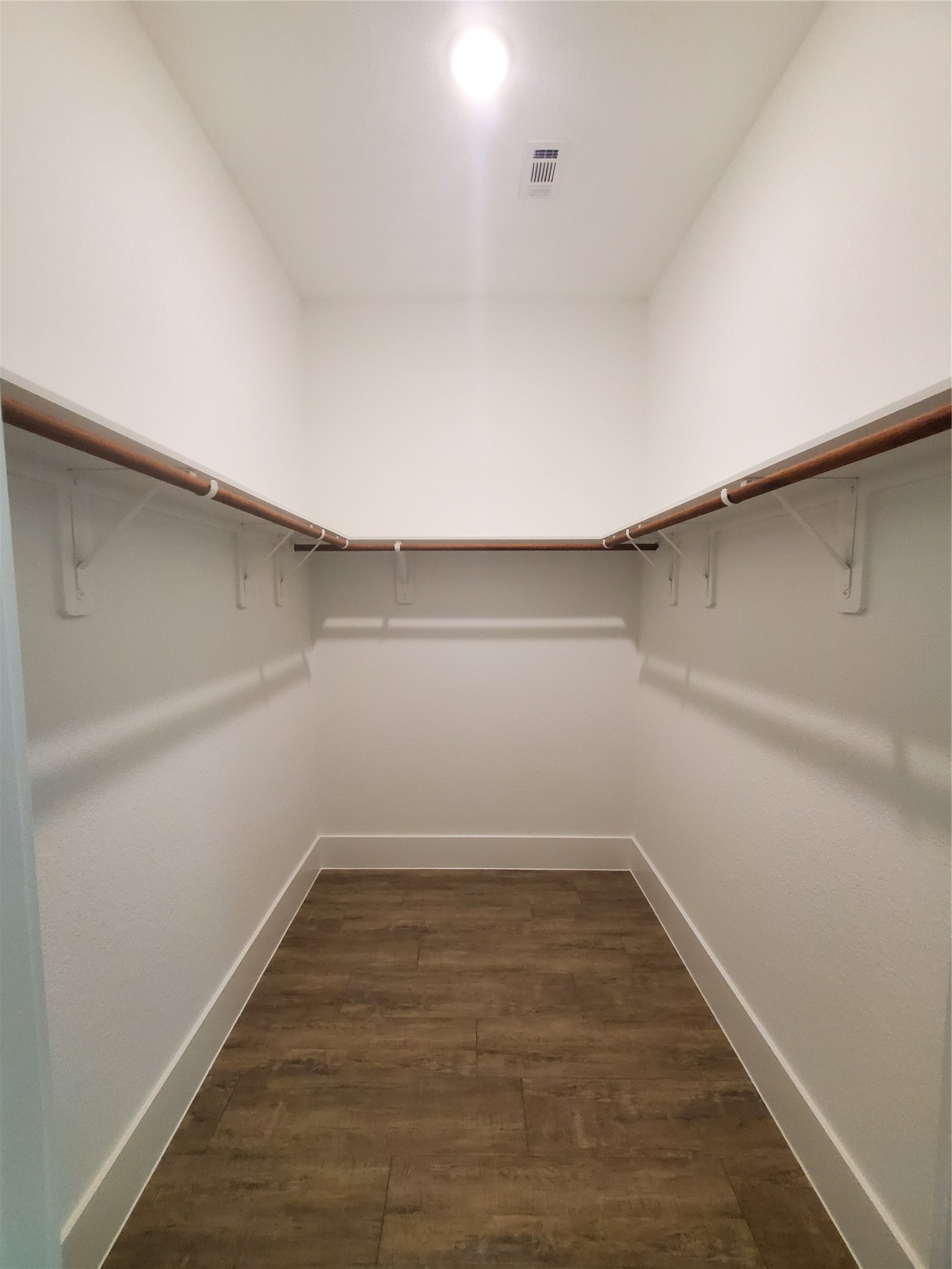 24647 Oak Creek Road Hockley, TX 77447 - Photo 18 of 47 a view of a room with empty racks