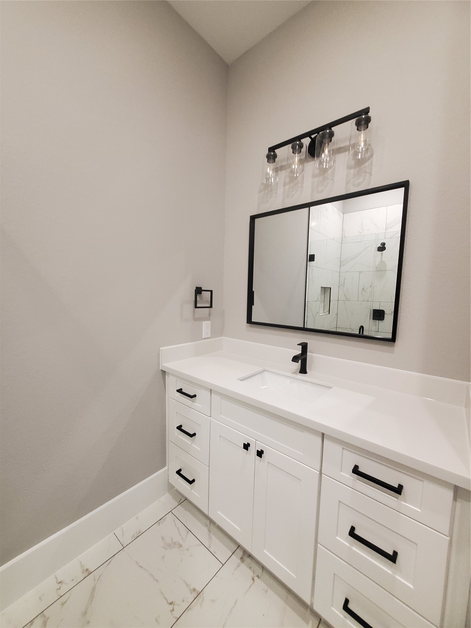24647 Oak Creek Road Hockley, TX 77447 - Photo 20 of 47 a bathroom with a sink and vanity
