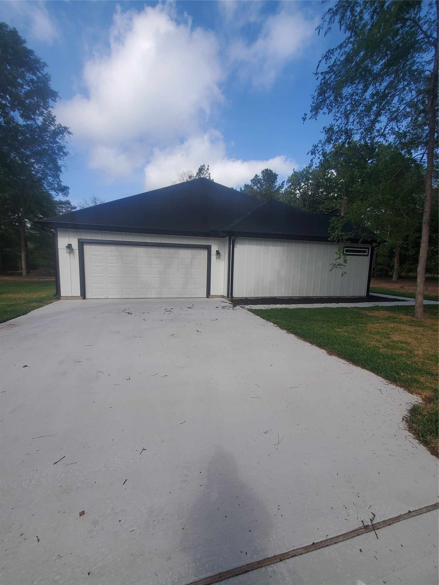 24647 Oak Creek Road Hockley, TX 77447 - Photo 3 of 47 a view of a house with a yard