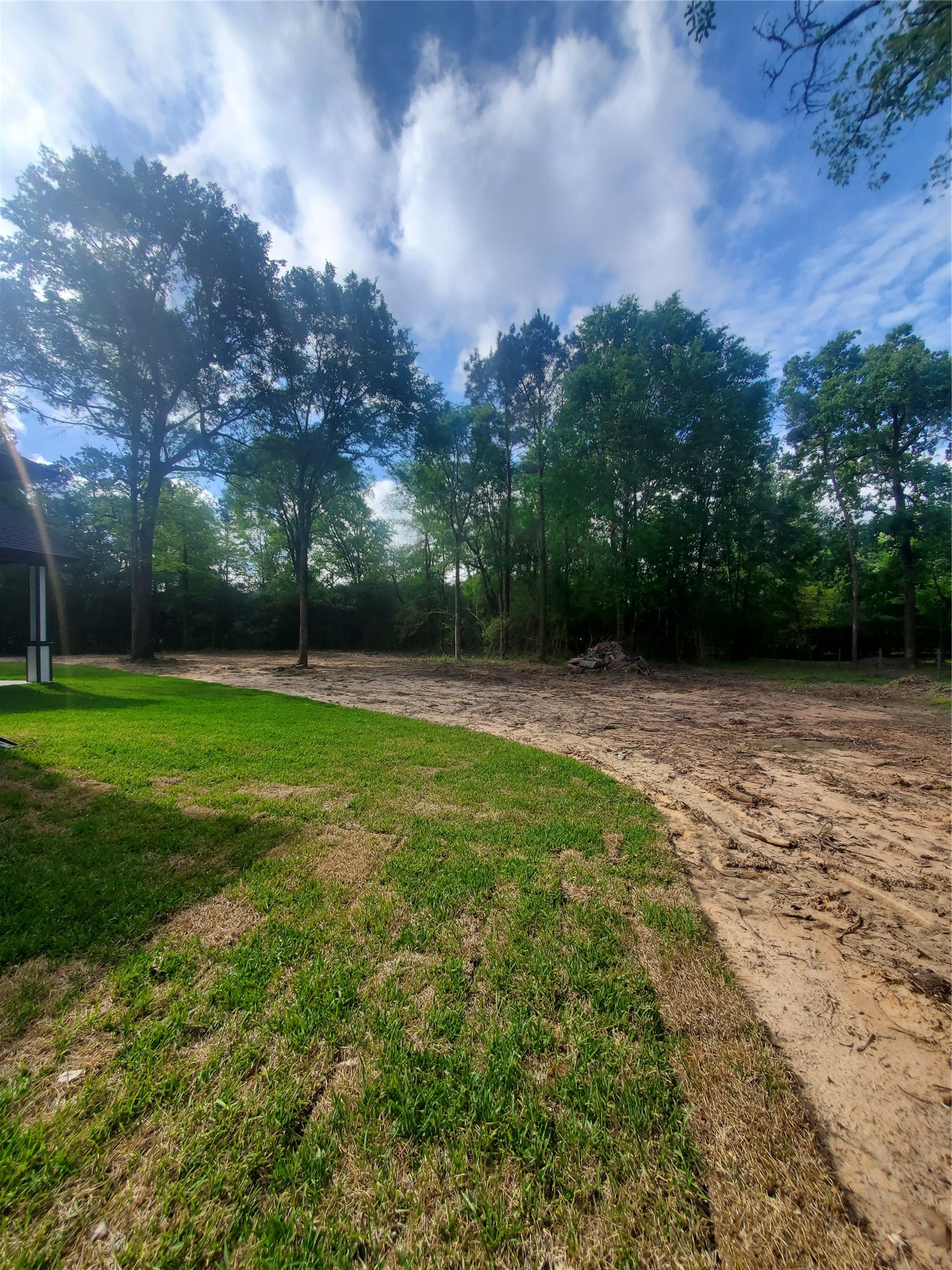 24647 Oak Creek Road Hockley, TX 77447 - Photo 40 of 47 a view of a green field with trees in the background