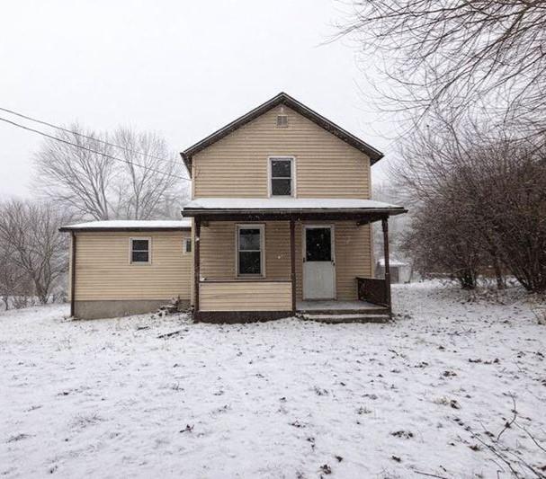 283 Portersville Road Ellwood City, PA 16117 - Photo 1 of 19 a view of a house with a yard