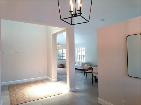 a view of a livingroom with a furniture and a window