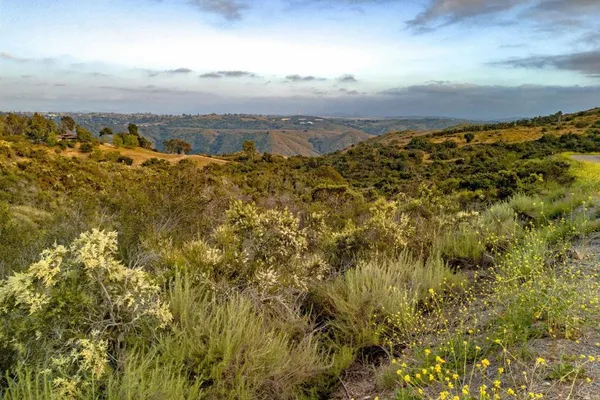 an aerial view of mountain with outdoor space