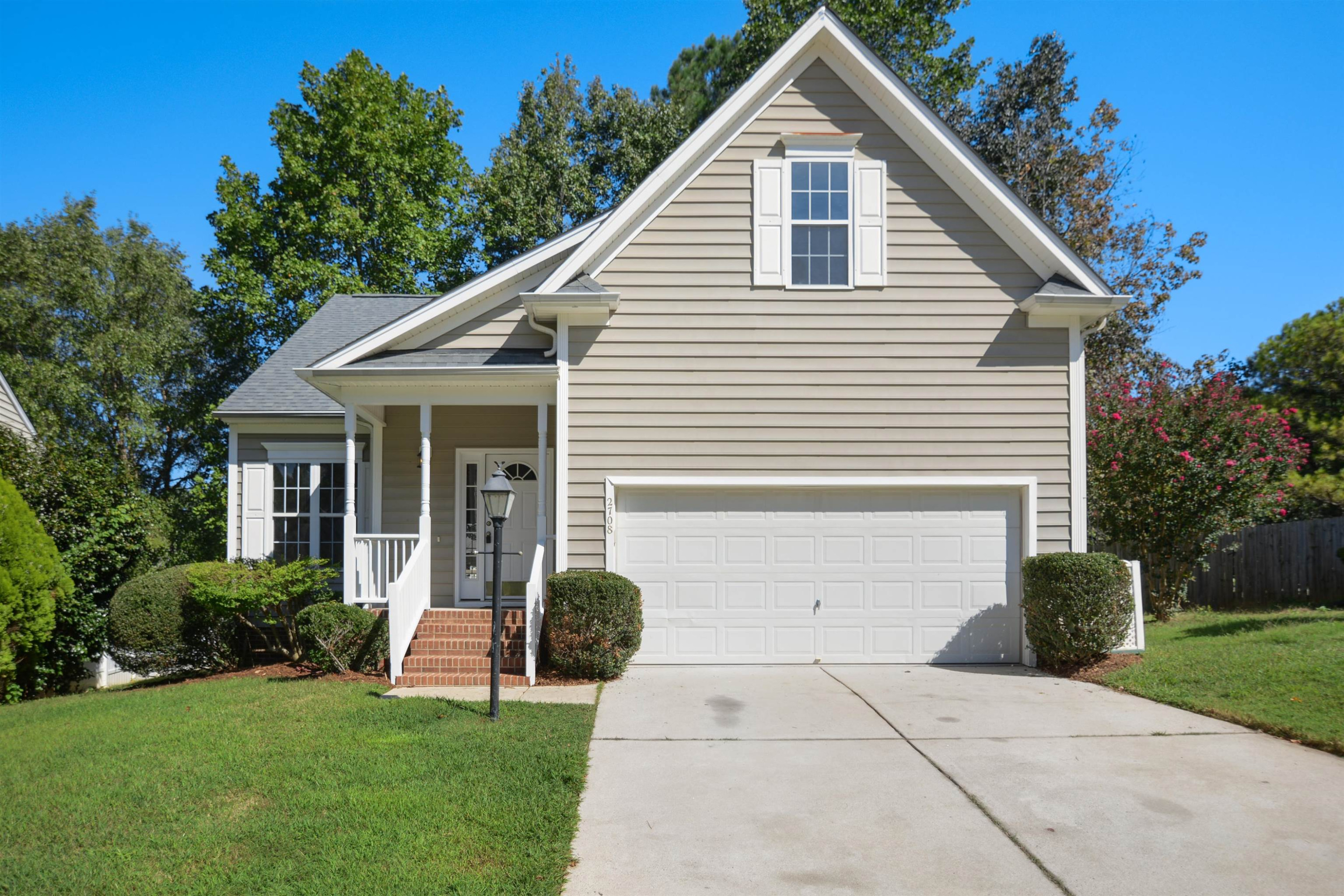 2708 Upper Dry Falls Court Raleigh, NC 27603 - Photo 1 of 16 a front view of house with yard and green space