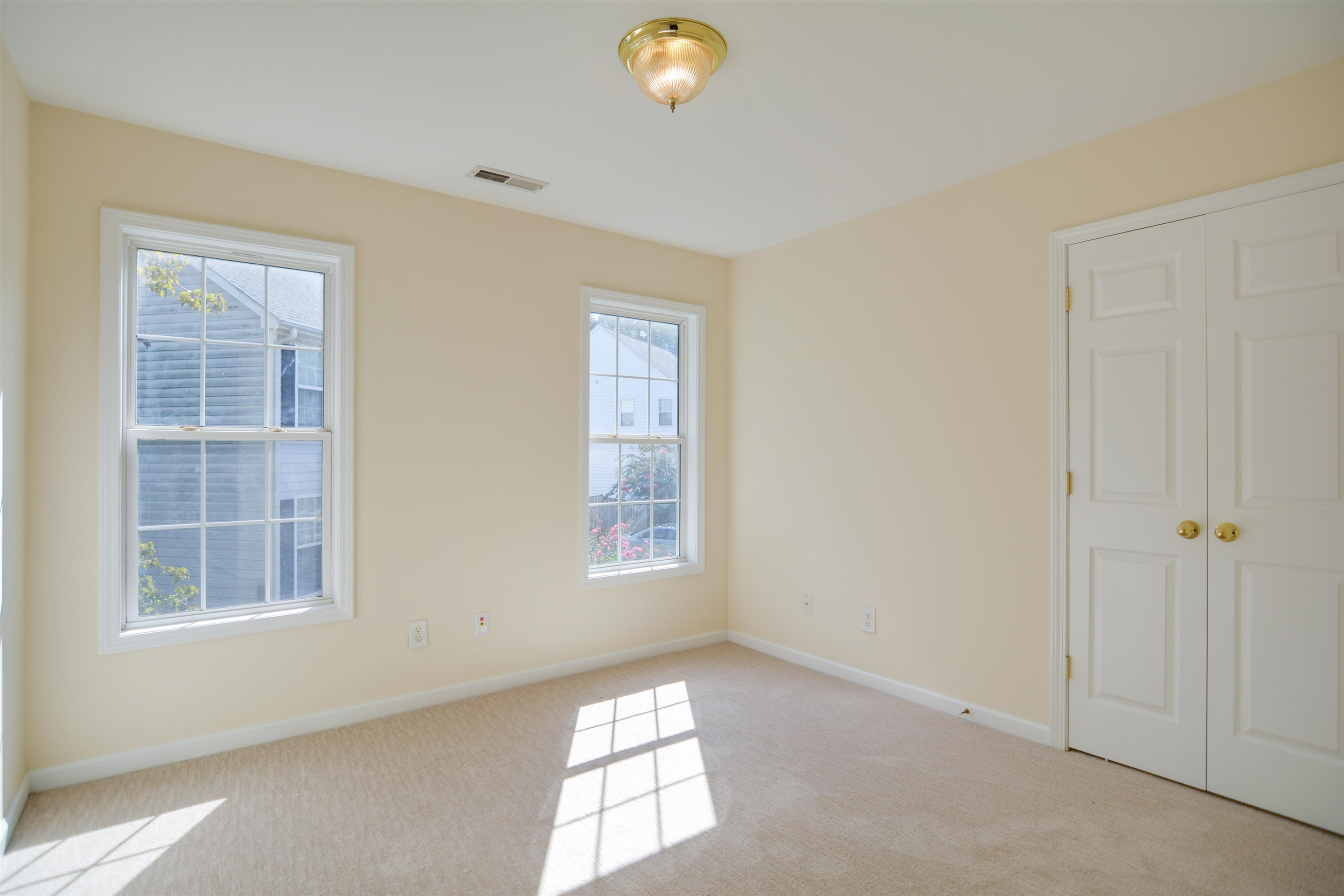 2708 Upper Dry Falls Court Raleigh, NC 27603 - Photo 11 of 16 an empty room with windows
