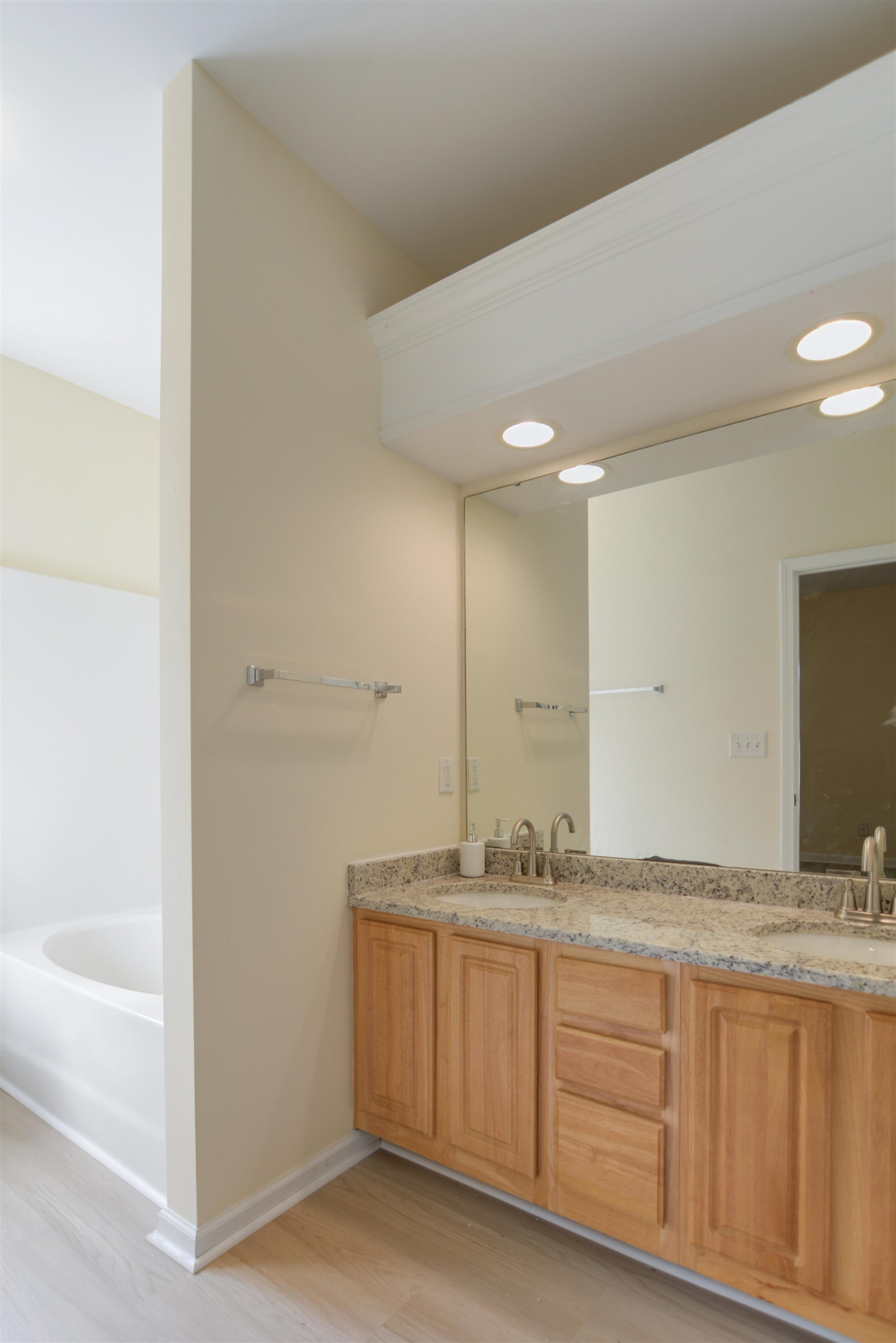 2708 Upper Dry Falls Court Raleigh, NC 27603 - Photo 9 of 16 a bathroom with a granite countertop sink and a mirror