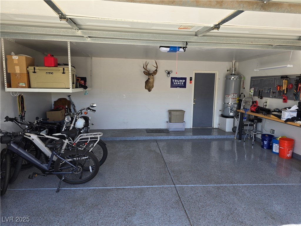 853 Rusty Anchor Way Henderson, NV 89002 - Photo 36 of 76 Garage with gas water heater and a garage door opener