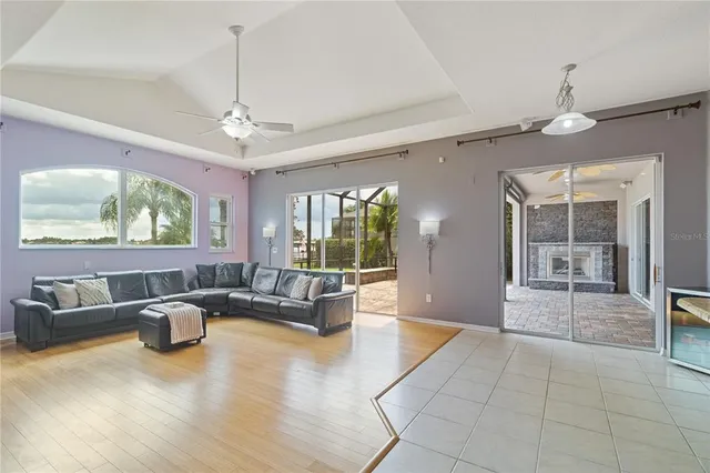 a spacious bedroom with a bed and a couch