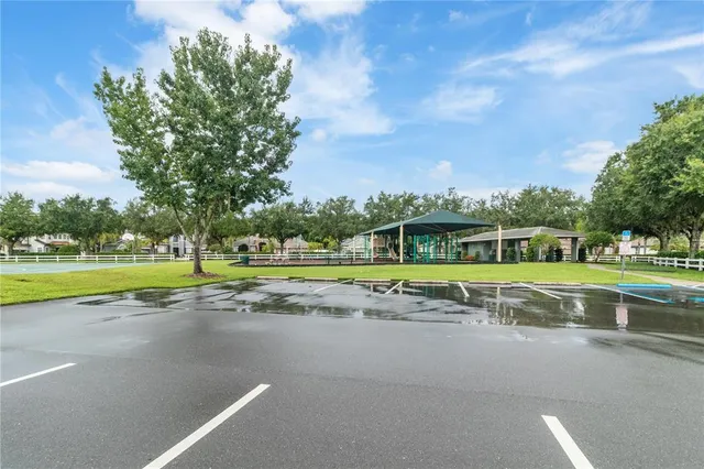 a view of a house with a big yard