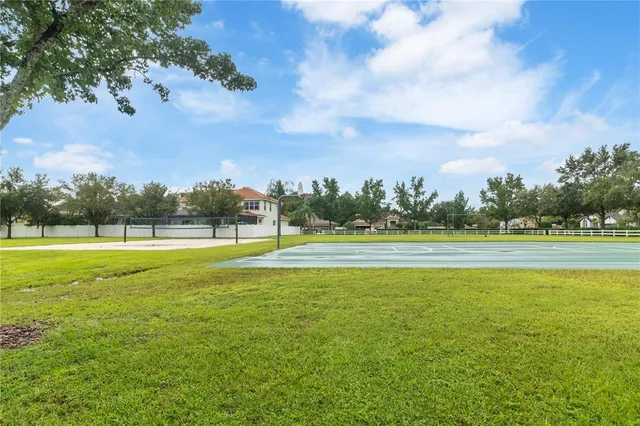 an aerial view of houses with yard