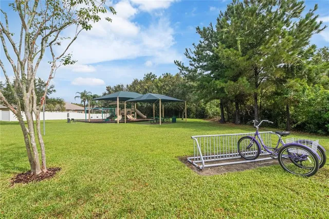 an aerial view of a houses with outdoor space