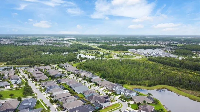 a view of a lake with a big yard