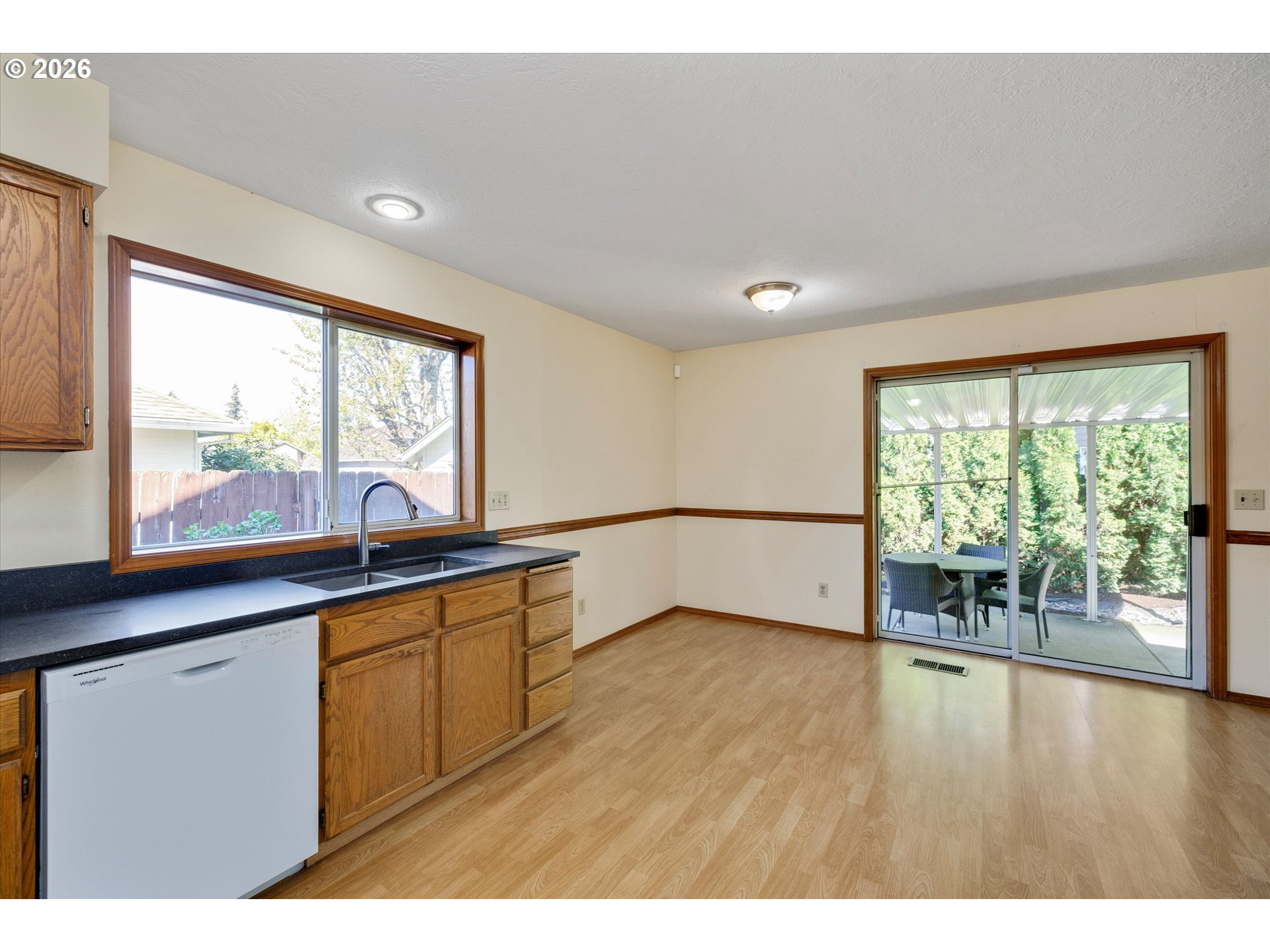 1360 North Locust Street Canby, OR 97013 - Photo 14 of 36 a view of a room with window wooden floor and windows
