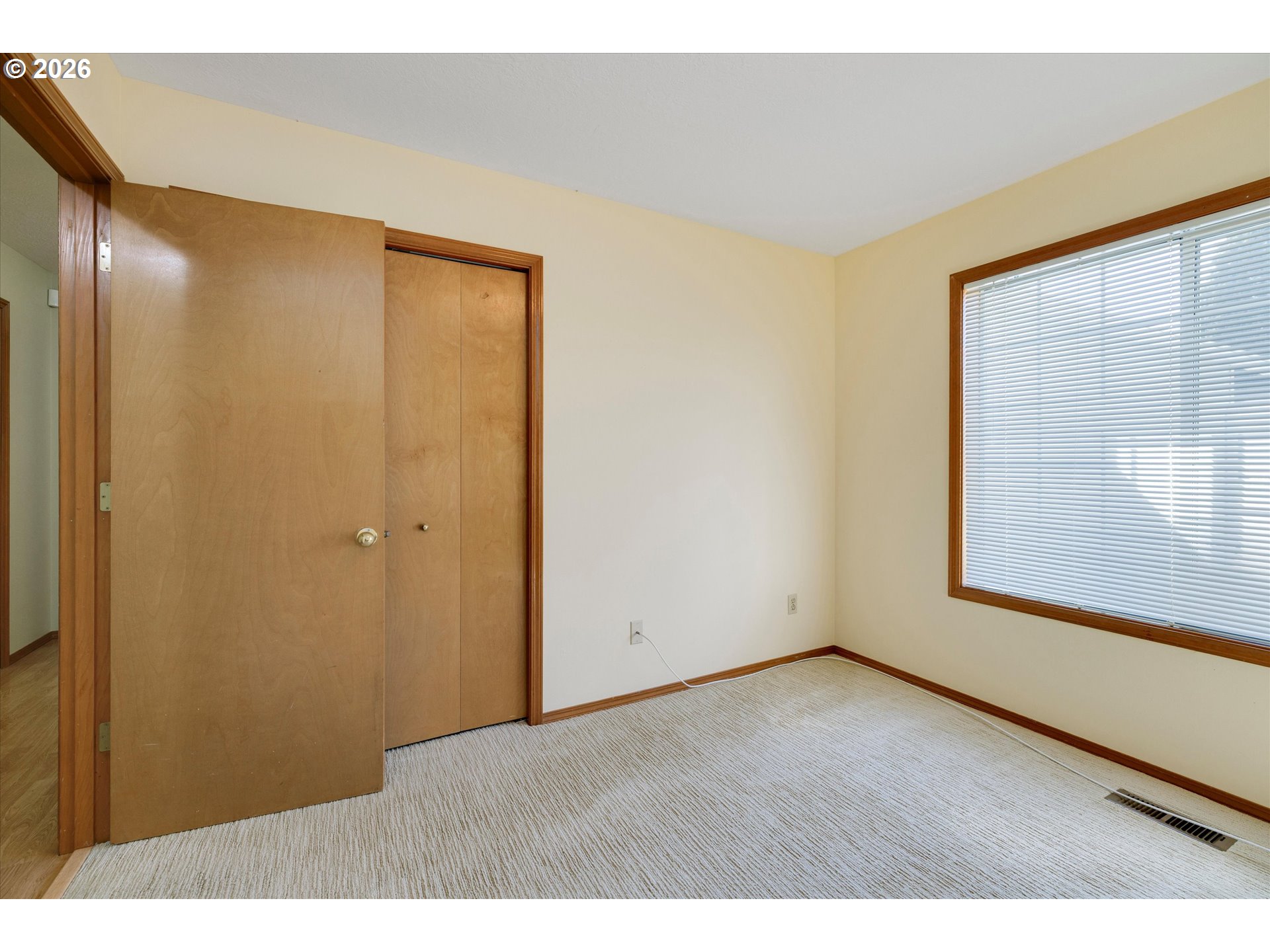 1360 North Locust Street Canby, OR 97013 - Photo 17 of 36 a view of an empty room with a window