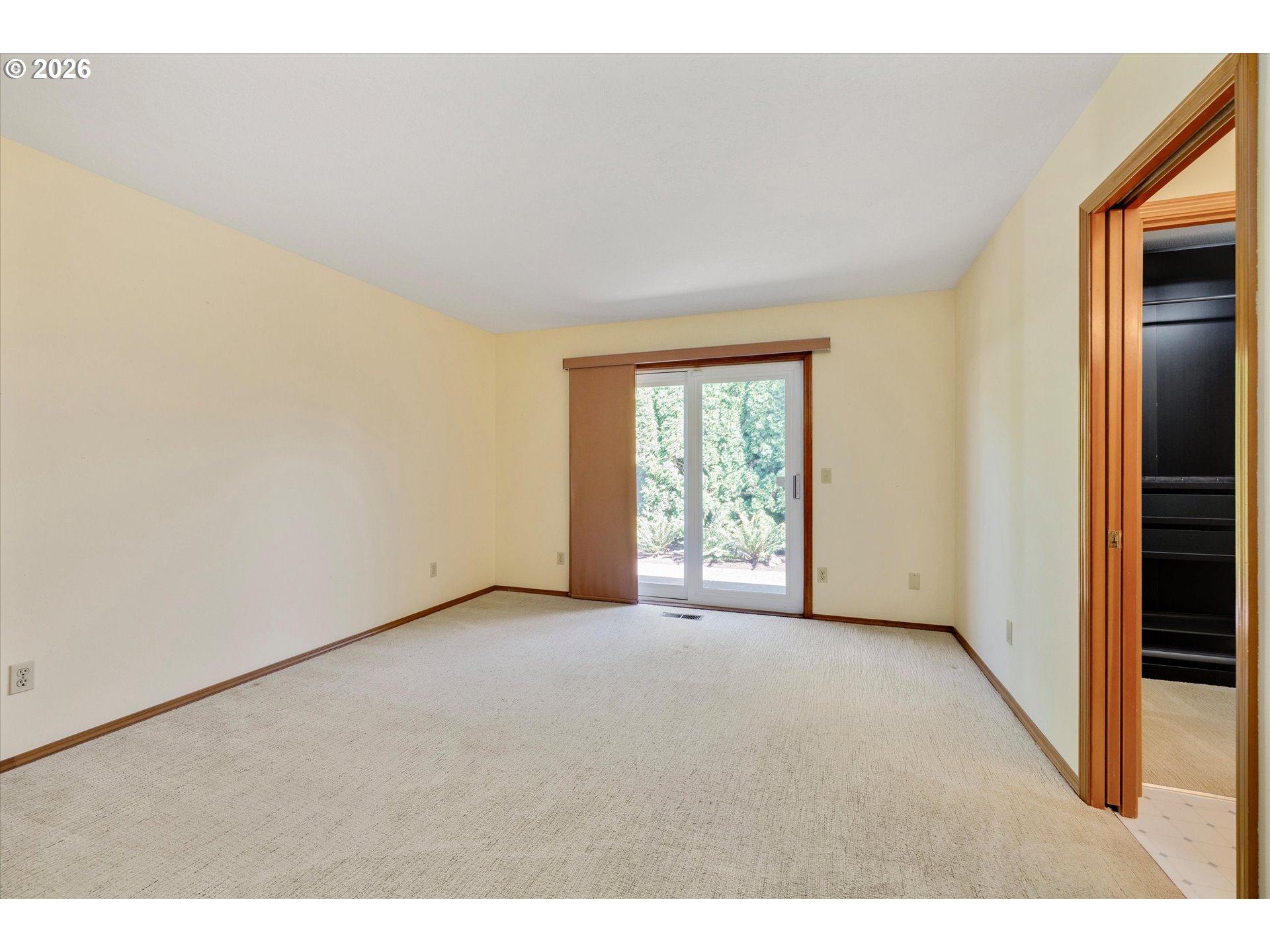 1360 North Locust Street Canby, OR 97013 - Photo 18 of 36 a view of an empty room with a window