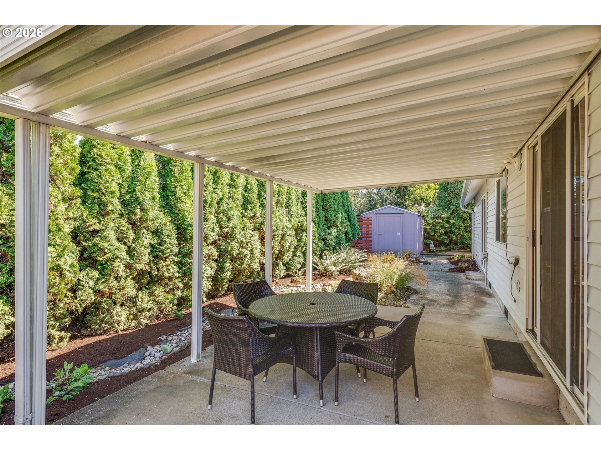1360 North Locust Street Canby, OR 97013 - Photo 28 of 36 a outdoor dining space with furniture and garden view