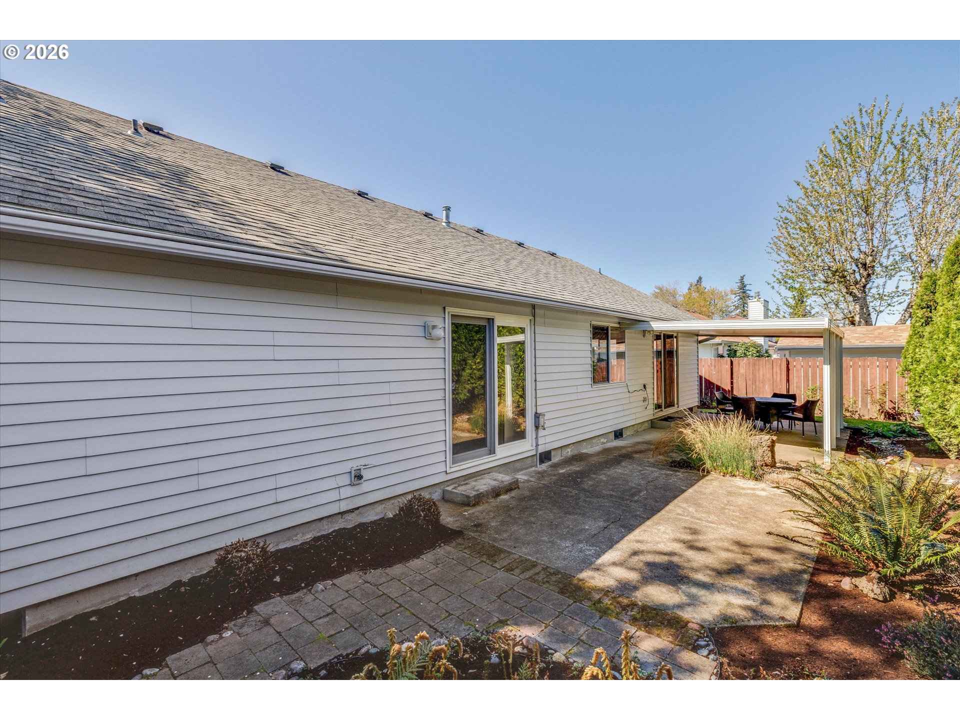 1360 North Locust Street Canby, OR 97013 - Photo 32 of 36 a view of a house with backyard