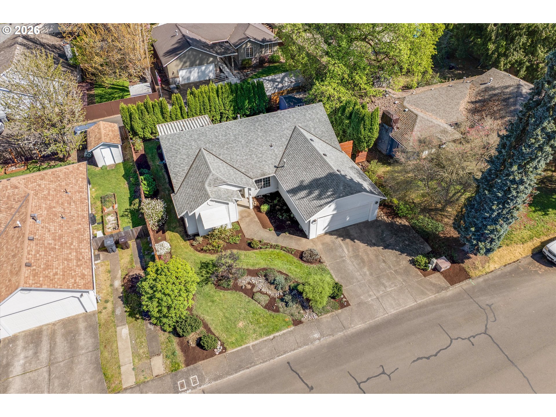 1360 North Locust Street Canby, OR 97013 - Photo 34 of 36 an aerial view of a house with a yard basket ball court and outdoor seating