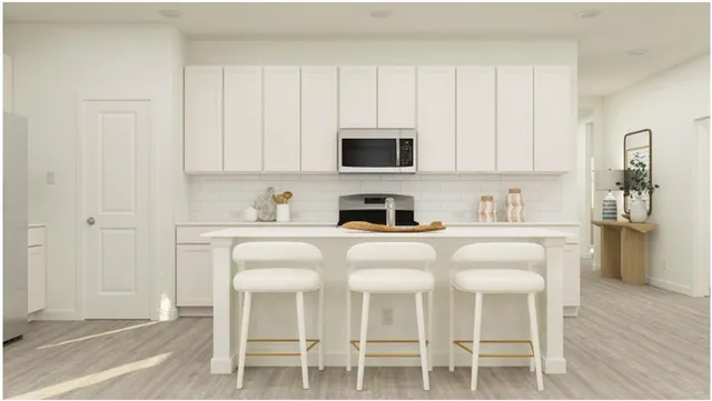 an aerial view of a house with a lake view