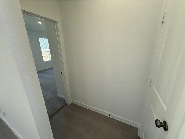 a view of an empty walk in closet