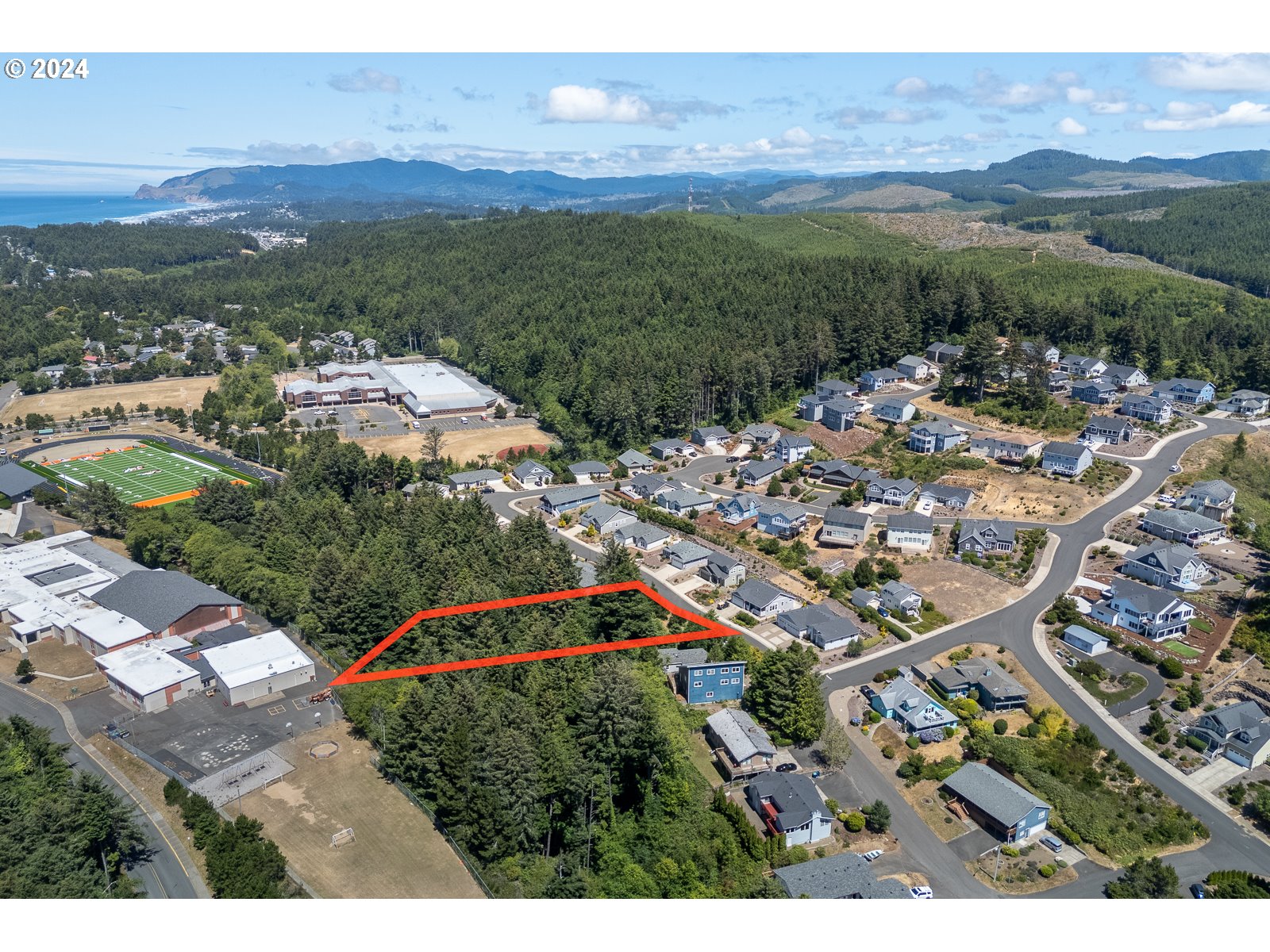 0 Southeast Inlet Avenue, Unit 34 Lincoln City, OR 97367 - Photo 6 of 9 a picture of city view with lots of trees