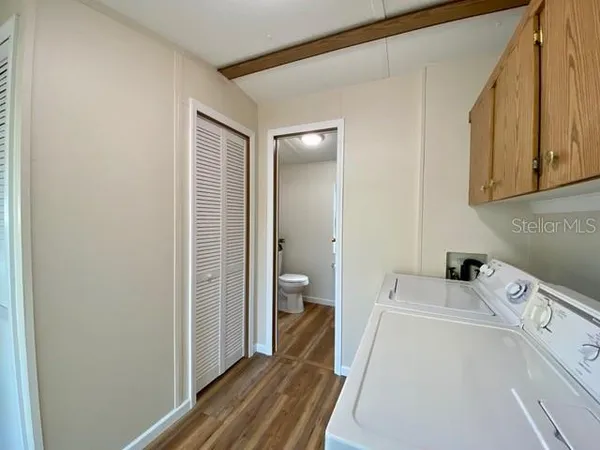 a bedroom with a bed and a view of bedroom