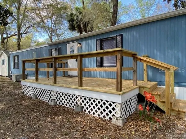 a view of a house with a deck