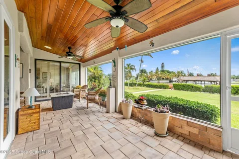 a spacious bathroom with a double vanity sink a mirror and a shower