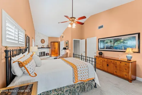 a view of a workspace with furniture and gym equipment