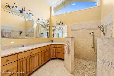 a view of a patio with a table chairs and a table