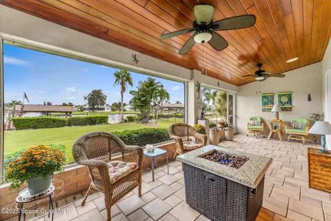 aerial view of a house with a yard