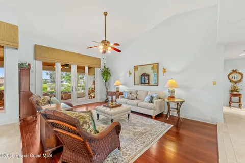 a kitchen with stainless steel appliances kitchen island granite countertop a sink and cabinets