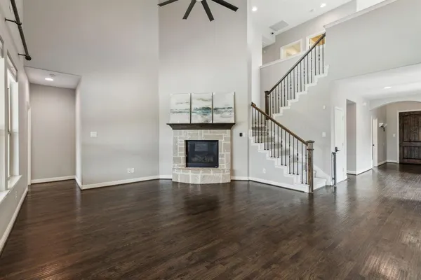 a view of an entryway with wooden floor