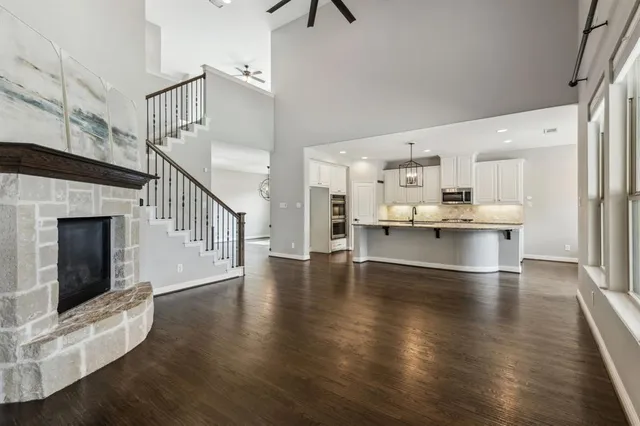 a view of kitchen with furniture and wooden floor