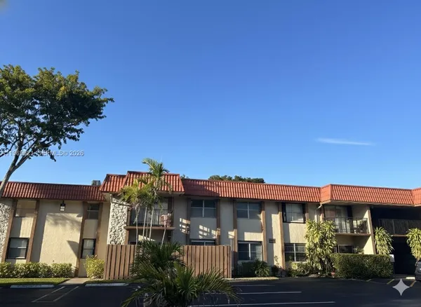 a front view of a house with balcony