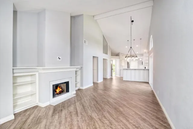 a view of a livingroom with wooden floor