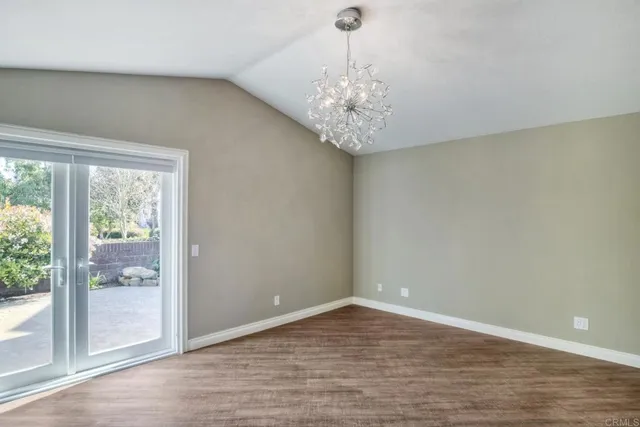 a view of a big room with windows