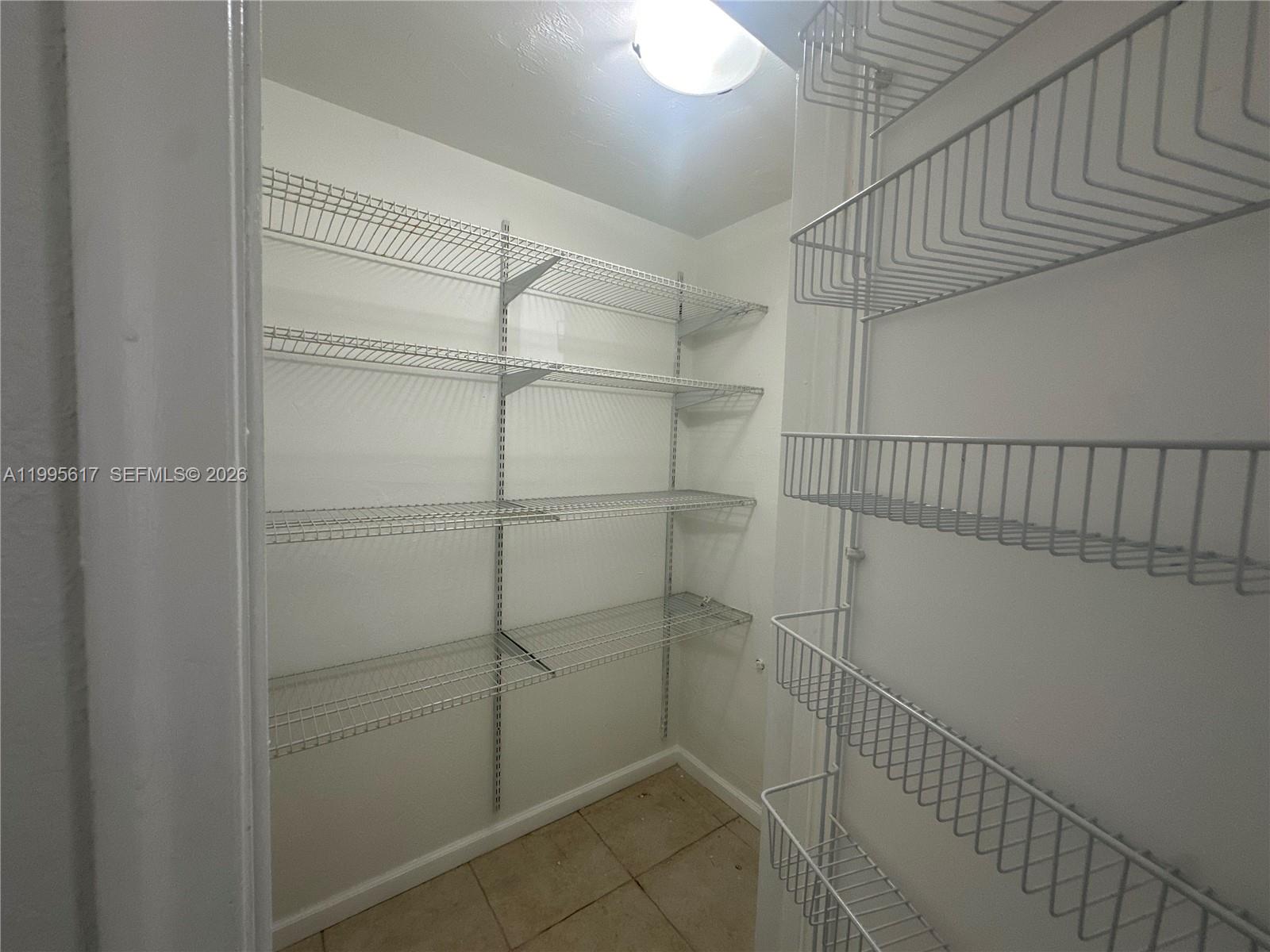 7951 Southwest 104th Street, Unit 209D Miami, FL 33156 - Photo 7 of 16 Very Spacious Pantry